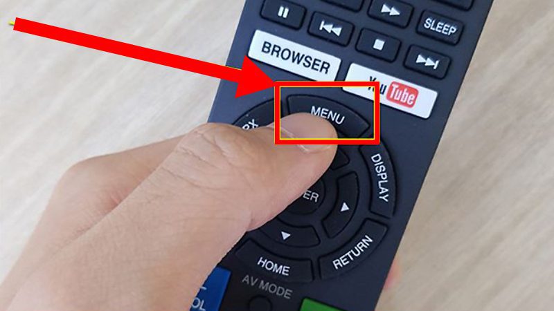 Nhấn phím MENU trên remote tivi